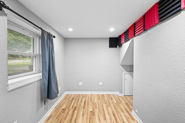 3523 Brookview Dr, Lexington, KY 40517 - spare room with wood finished floors, recessed lighting, and a textured wall