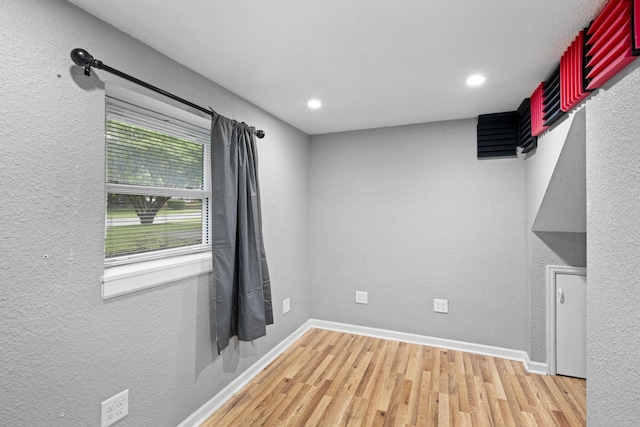 3523 Brookview Dr, Lexington, KY 40517 - unfurnished room with wood finished floors, recessed lighting, and a textured wall