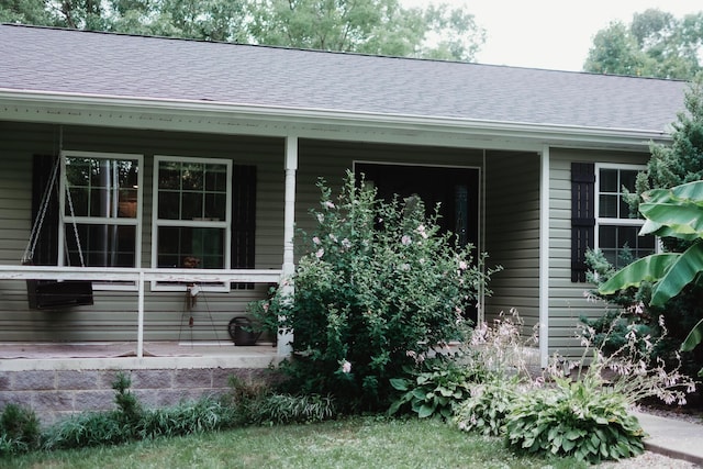 585 Cotton Rd, Corbin, KY 40701 - doorway to property with a shingled roof and covered porch