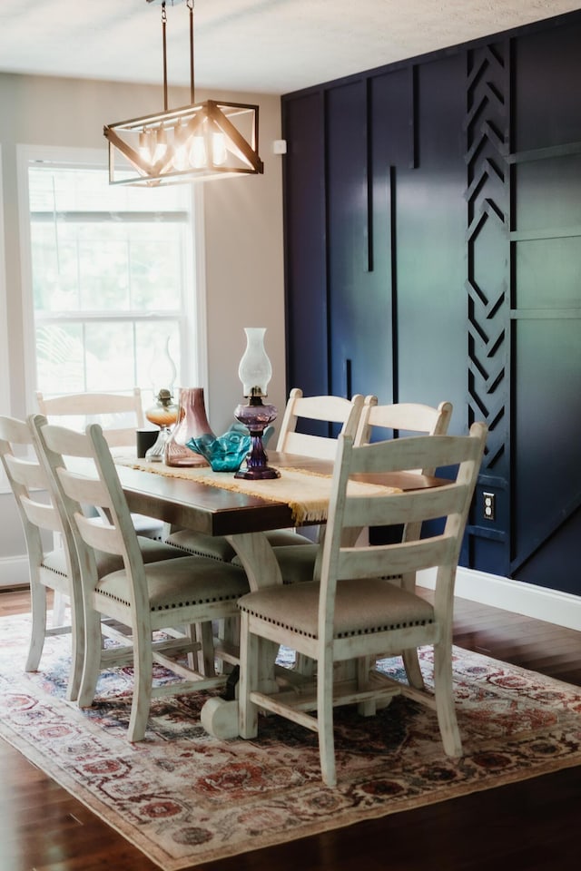 585 Cotton Rd, Corbin, KY 40701 - dining room with wood finished floors and a chandelier