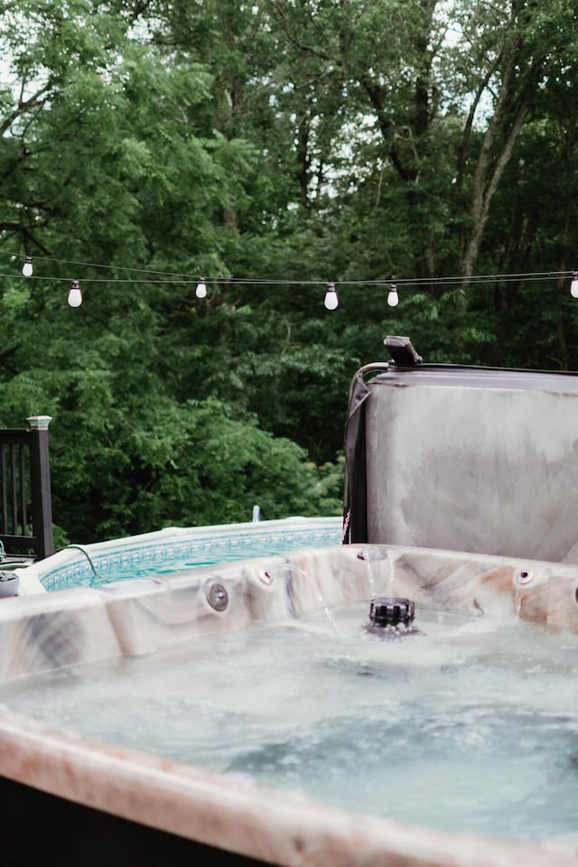 585 Cotton Rd, Corbin, KY 40701 - exterior view of a pool and a heavily wooded area