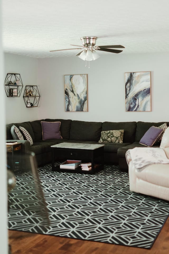 585 Cotton Rd, Corbin, KY 40701 - living room featuring ceiling fan and wood finished floors