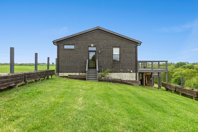 60 Pilots Dream Dr, Dry Ridge, KY 41035 - rear view of property with a yard, brick siding, and a wooden deck