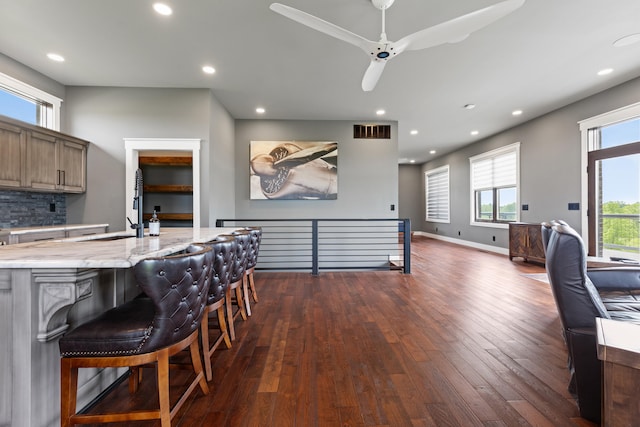 60 Pilots Dream Dr, Dry Ridge, KY 41035 - kitchen featuring dark wood-type flooring, recessed lighting, a ceiling fan, light stone counters, and a breakfast bar area