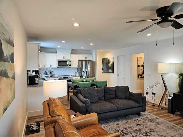 209-211 Wyldwood Way, Berea, KY 40403 - living room featuring wood finished floors, a ceiling fan, and recessed lighting