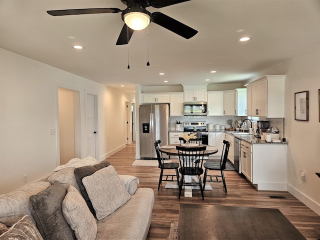 209-211 Wyldwood Way, Berea, KY 40403 - living area with a ceiling fan, dark wood-style flooring, and recessed lighting