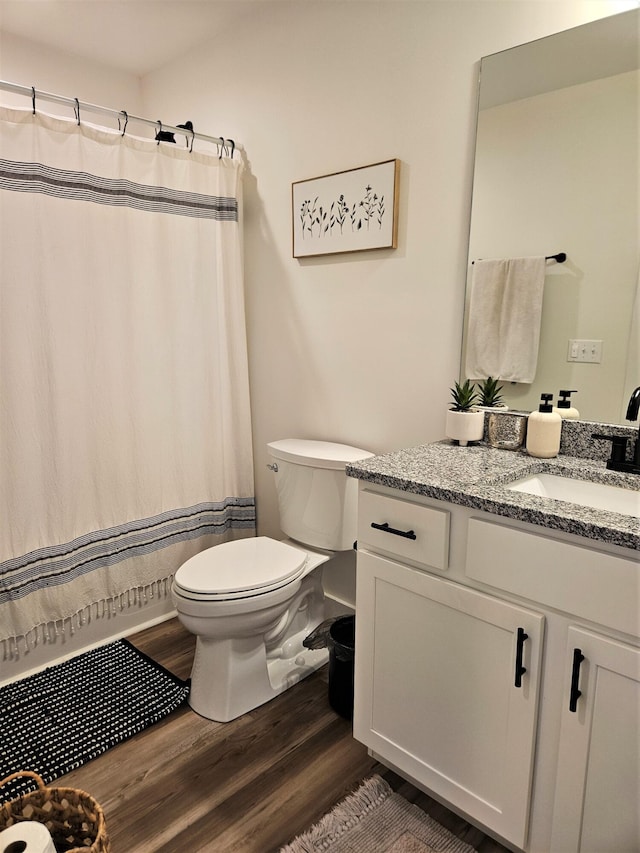 209-211 Wyldwood Way, Berea, KY 40403 - bathroom with wood finished floors, vanity, and a shower with shower curtain