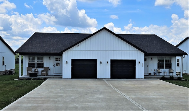 209-211 Wyldwood Way, Berea, KY 40403 - modern inspired farmhouse with covered porch, a garage, concrete driveway, and a shingled roof