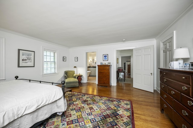 321 S Turner St, Midway, KY 40347 - bedroom with wood finished floors, crown molding, and connected bathroom