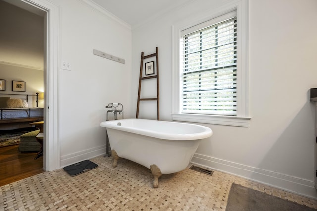 321 S Turner St, Midway, KY 40347 - bathroom featuring ornamental molding and a freestanding bath