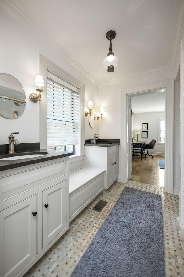 321 S Turner St, Midway, KY 40347 - bathroom with crown molding, two vanities, and tile patterned floors