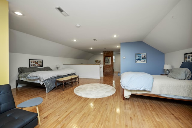 321 S Turner St, Midway, KY 40347 - bedroom with vaulted ceiling and hardwood / wood-style flooring