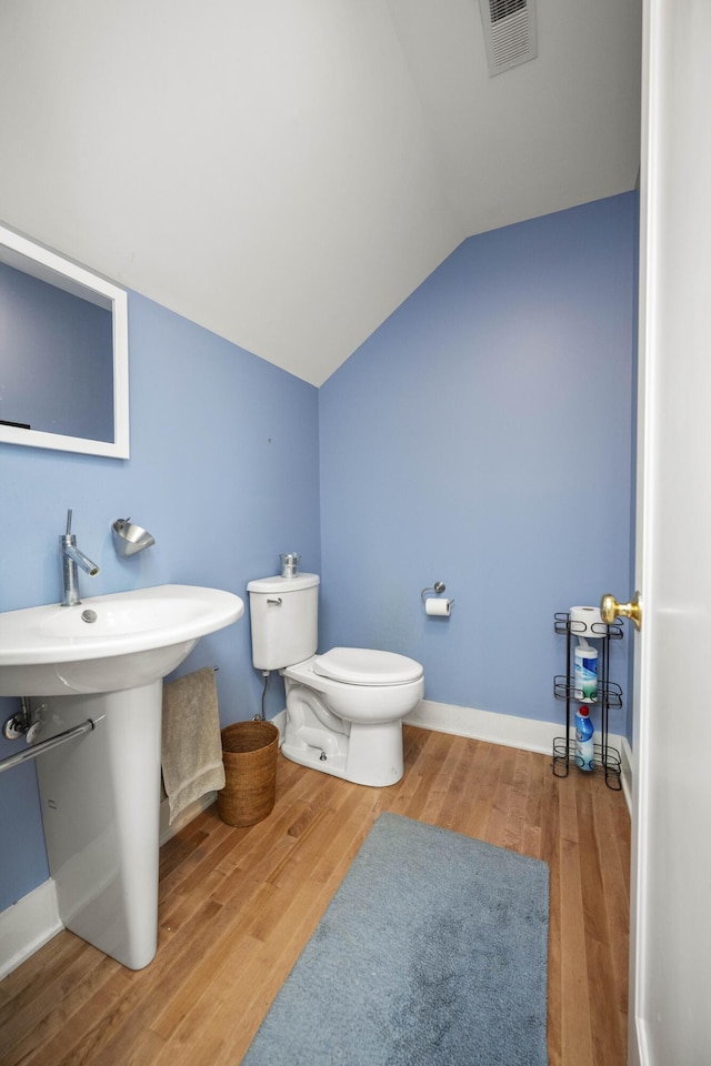 321 S Turner St, Midway, KY 40347 - half bathroom with vaulted ceiling and wood finished floors