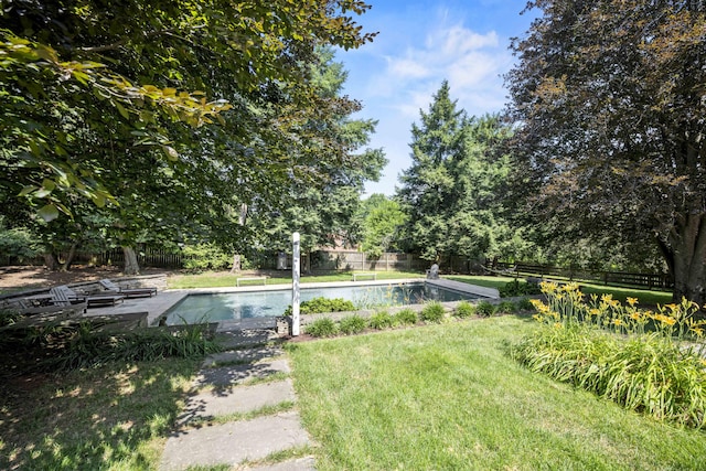 321 S Turner St, Midway, KY 40347 - fenced backyard featuring view of scattered trees