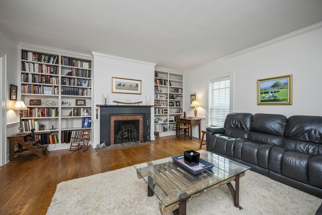 321 S Turner St, Midway, KY 40347 - living area with wood finished floors, built in features, a fireplace, and crown molding