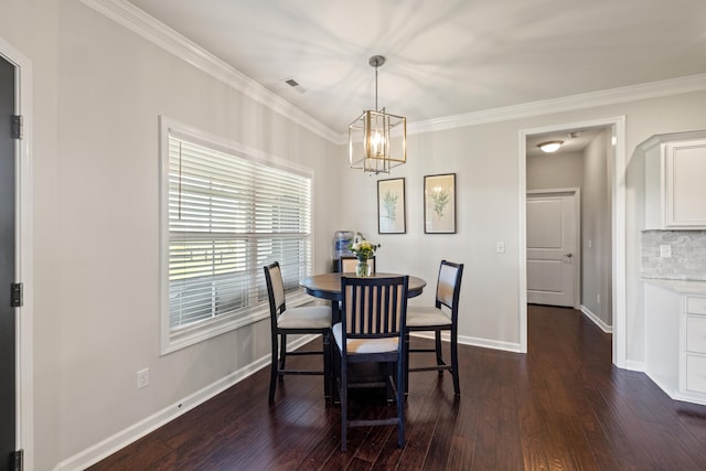 111 Colonial Dr, Versailles, KY 40383 - dining space with a chandelier, dark wood-style floors, and crown molding