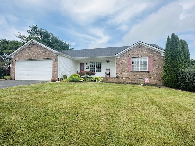 218 Foster Ln, Stanford, KY 40484 - view of front facade featuring brick siding, asphalt driveway, a porch, a front lawn, and a garage