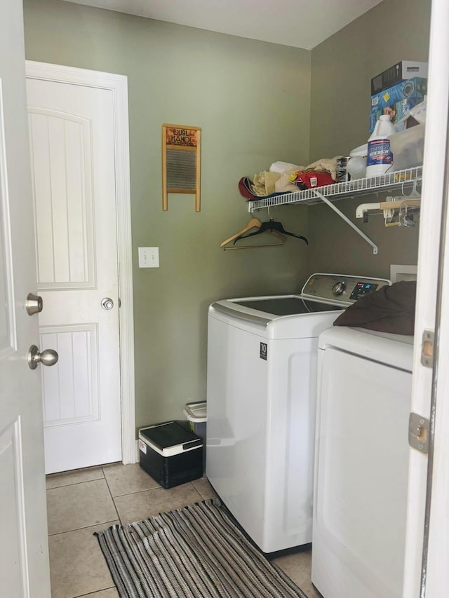 218 Foster Ln, Stanford, KY 40484 - laundry area with washing machine and clothes dryer and light tile patterned floors