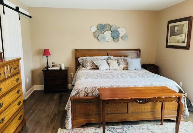 218 Foster Ln, Stanford, KY 40484 - bedroom with dark wood finished floors and a barn door