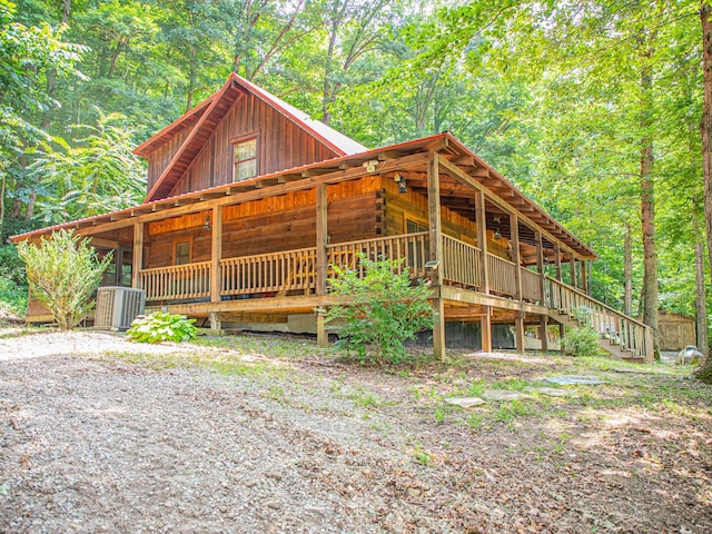 843 Joe Henson Rd, Dunnville, KY 42528 - view of front of home featuring a wooded view and stairs