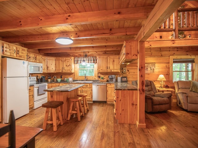 843 Joe Henson Rd, Dunnville, KY 42528 - kitchen with white appliances, dark countertops, healthy amount of natural light, open floor plan, and a wooden ceiling with exposed beams