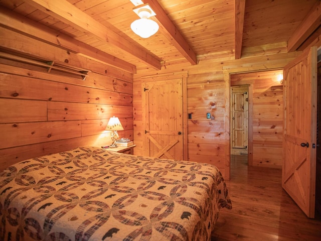 843 Joe Henson Rd, Dunnville, KY 42528 - bedroom featuring a wood ceiling with exposed beams, wooden walls, and wood finished floors
