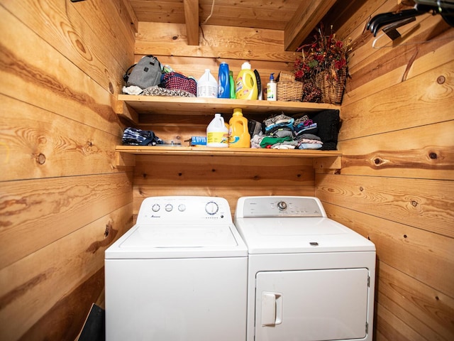 843 Joe Henson Rd, Dunnville, KY 42528 - washroom featuring separate washer and dryer, wood walls, and wooden ceiling