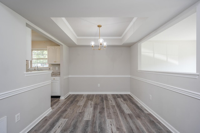 321 Houston Creek Dr, Paris, KY 40361 - unfurnished dining area featuring a raised ceiling, a chandelier, dark wood-type flooring, and crown molding