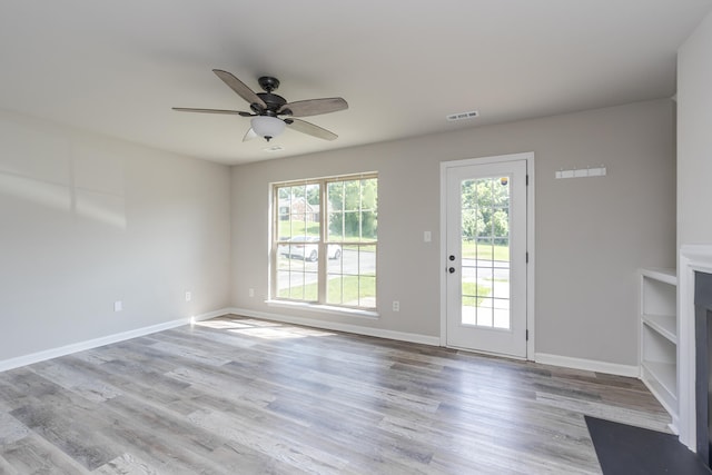 321 Houston Creek Dr, Paris, KY 40361 - unfurnished living room featuring ceiling fan and wood finished floors