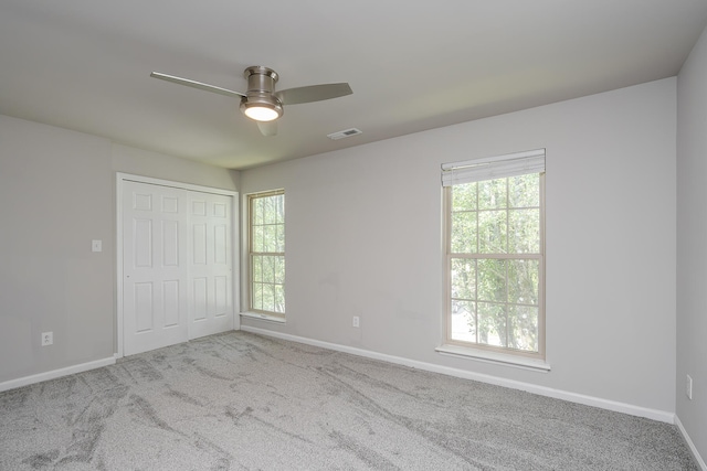 321 Houston Creek Dr, Paris, KY 40361 - unfurnished bedroom featuring carpet, ceiling fan, and a closet