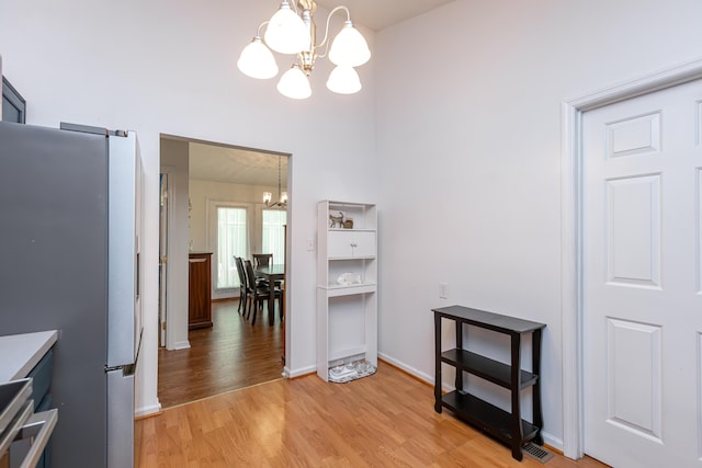 129 Plantation Dr, Lawrenceburg, KY 40342 - dining space with a chandelier and light wood-style flooring