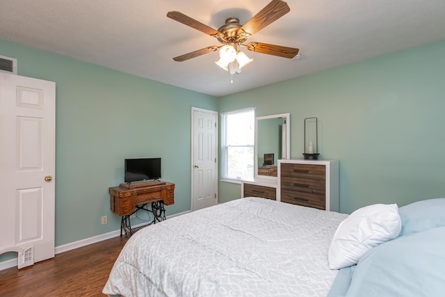 129 Plantation Dr, Lawrenceburg, KY 40342 - bedroom featuring dark wood-type flooring and a ceiling fan