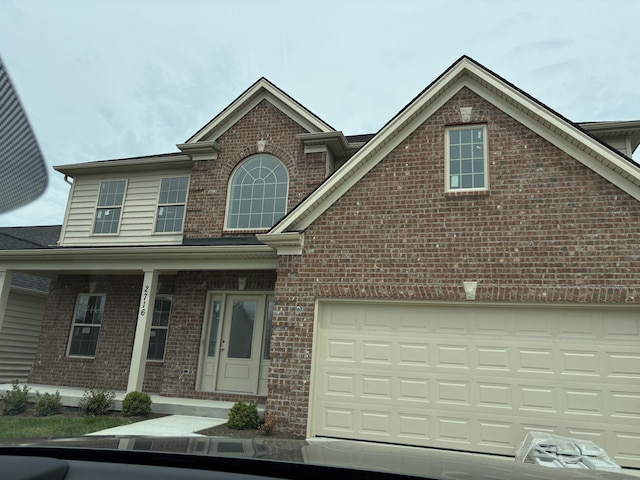 2716 Kearney Creek Ln, Lexington, KY 40511 - view of front facade featuring brick siding and a garage