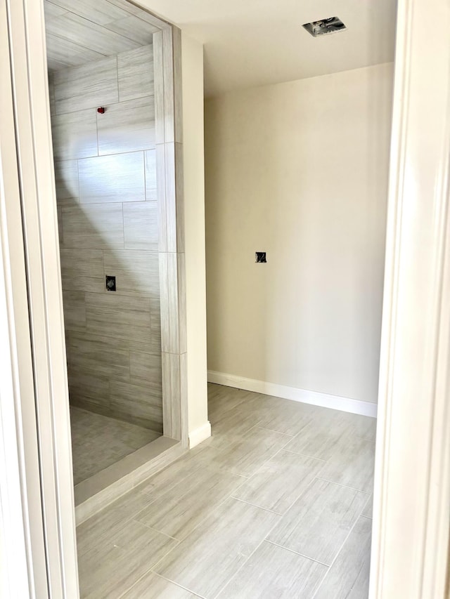 2716 Kearney Creek Ln, Lexington, KY 40511 - bathroom featuring wood tiled floors and tiled shower
