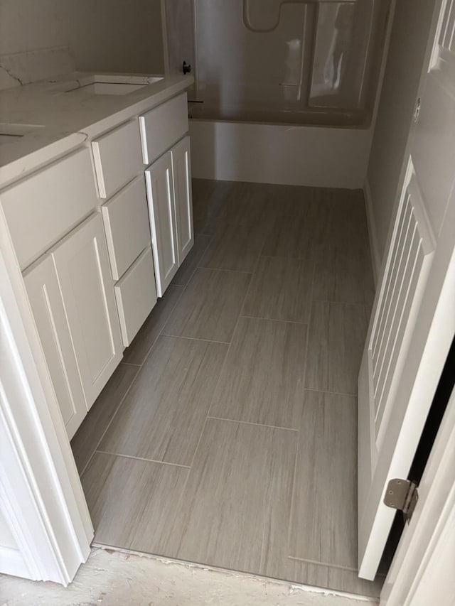 2716 Kearney Creek Ln, Lexington, KY 40511 - bathroom with washtub / shower combination and vanity