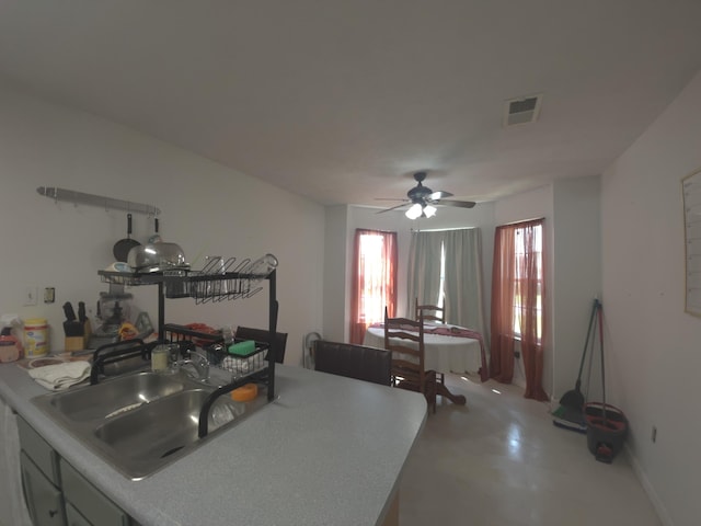 3004 Bell Ct, Richmond, KY 40475 - kitchen with ceiling fan, light countertops, and finished concrete flooring