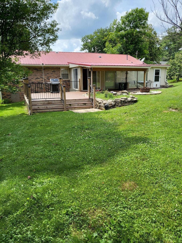 664 Linda Ave, Danville, KY 40422 - back of house with a wooden deck, a yard, and a metal roof