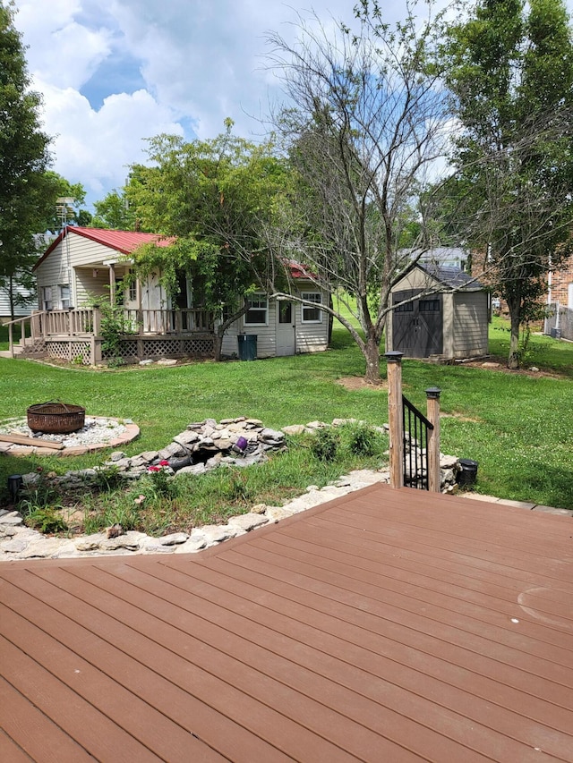 664 Linda Ave, Danville, KY 40422 - wooden deck featuring a fire pit, a yard, and a storage unit