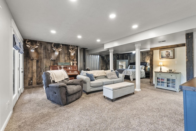 1020 Cornish Ln, Lawrenceburg, KY 40342 - carpeted living room featuring wood walls, recessed lighting, and decorative columns