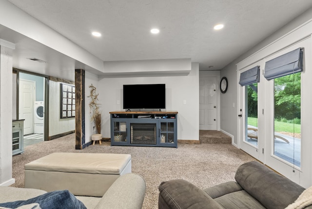 1020 Cornish Ln, Lawrenceburg, KY 40342 - living area featuring carpet flooring, recessed lighting, washer / clothes dryer, and a glass covered fireplace