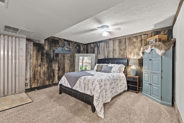 1020 Cornish Ln, Lawrenceburg, KY 40342 - carpeted bedroom featuring wooden walls, a textured ceiling, and ceiling fan