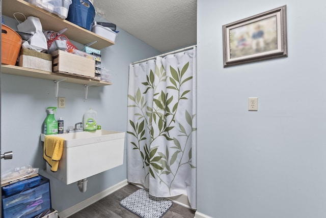 1020 Cornish Ln, Lawrenceburg, KY 40342 - interior space with wood finished floors, a textured ceiling, and a shower with shower curtain