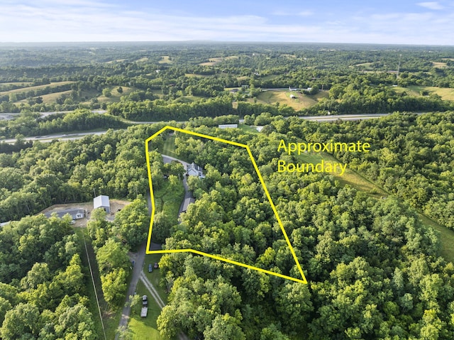 1020 Cornish Ln, Lawrenceburg, KY 40342 - aerial view of property and surrounding area featuring a forest and property boundaries highlighted