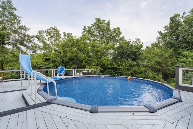 1020 Cornish Ln, Lawrenceburg, KY 40342 - outdoor pool featuring a deck and view of wooded area