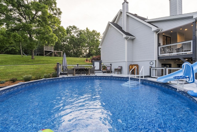 1020 Cornish Ln, Lawrenceburg, KY 40342 - outdoor pool featuring a water slide and a lawn