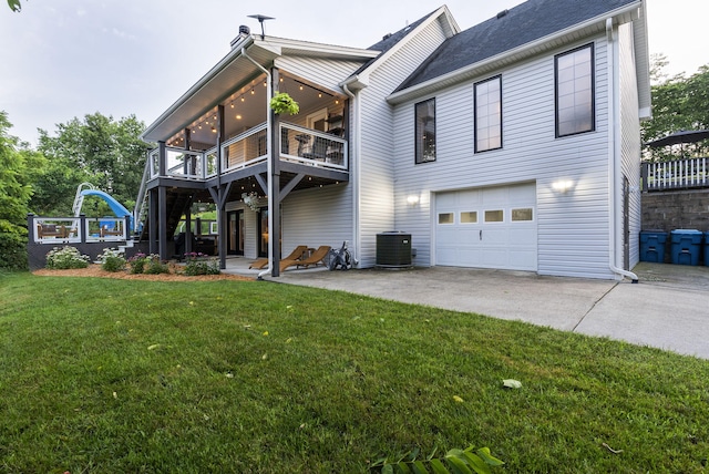 1020 Cornish Ln, Lawrenceburg, KY 40342 - back of house with a balcony, an attached garage, a yard, a patio, and driveway