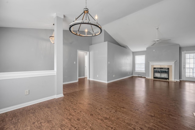 2916 Sandersville Rd, Lexington, KY 40511 - unfurnished living room featuring plenty of natural light, a chandelier, a ceiling fan, wood finished floors, and high vaulted ceiling