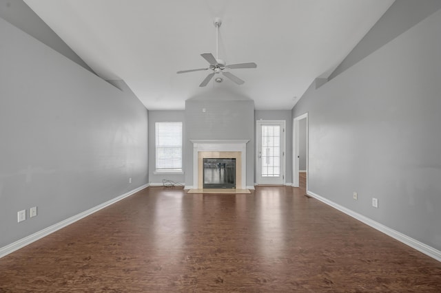 2916 Sandersville Rd, Lexington, KY 40511 - unfurnished living room featuring lofted ceiling, wood finished floors, a ceiling fan, and a premium fireplace