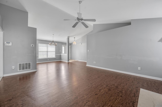 2916 Sandersville Rd, Lexington, KY 40511 - unfurnished living room featuring lofted ceiling, a ceiling fan, wood finished floors, and a chandelier
