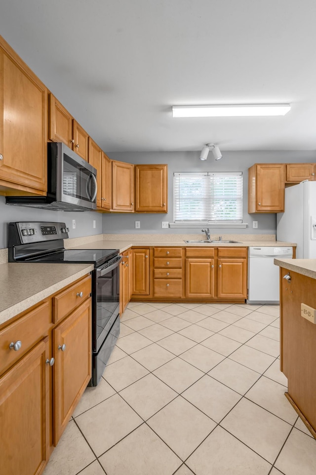 2916 Sandersville Rd, Lexington, KY 40511 - kitchen with white appliances, light countertops, and light tile patterned flooring